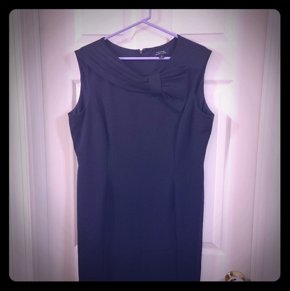 Tahari knee-length dress in black.